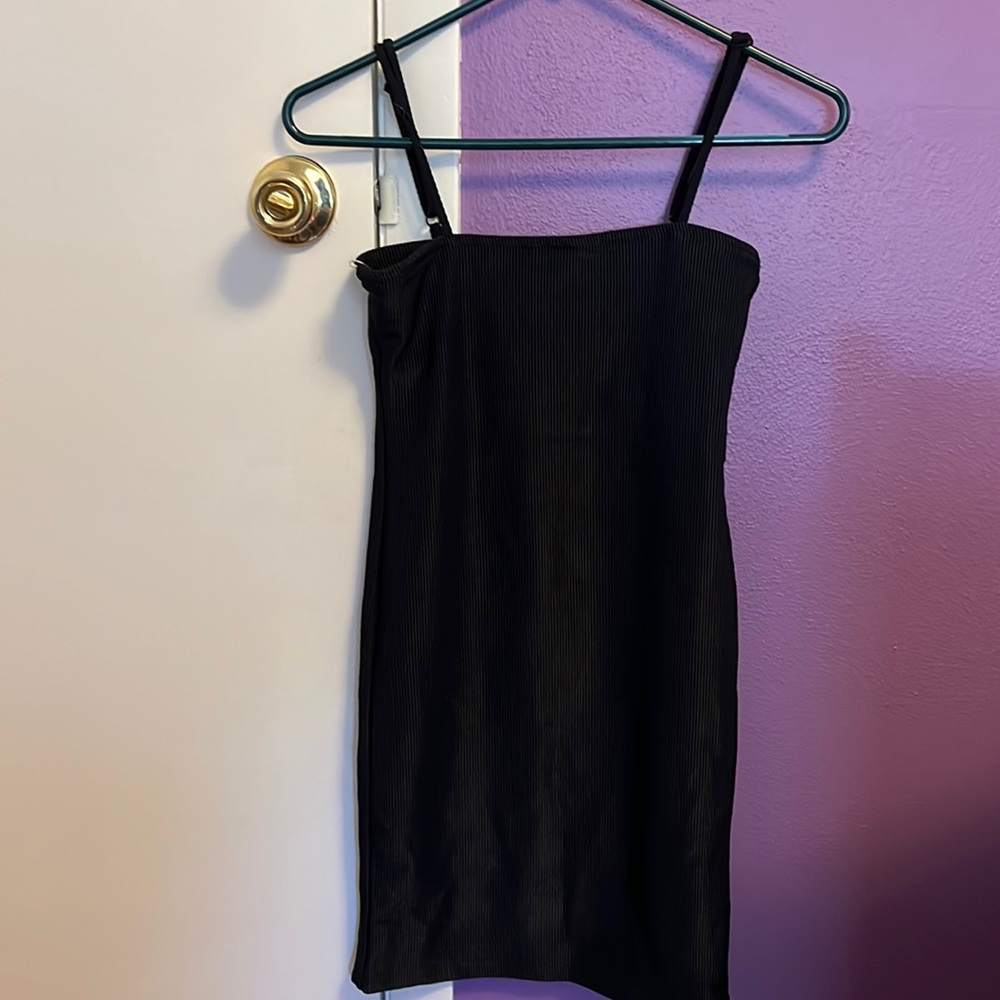 Black bodycon dress. NanaMacs. Size small.